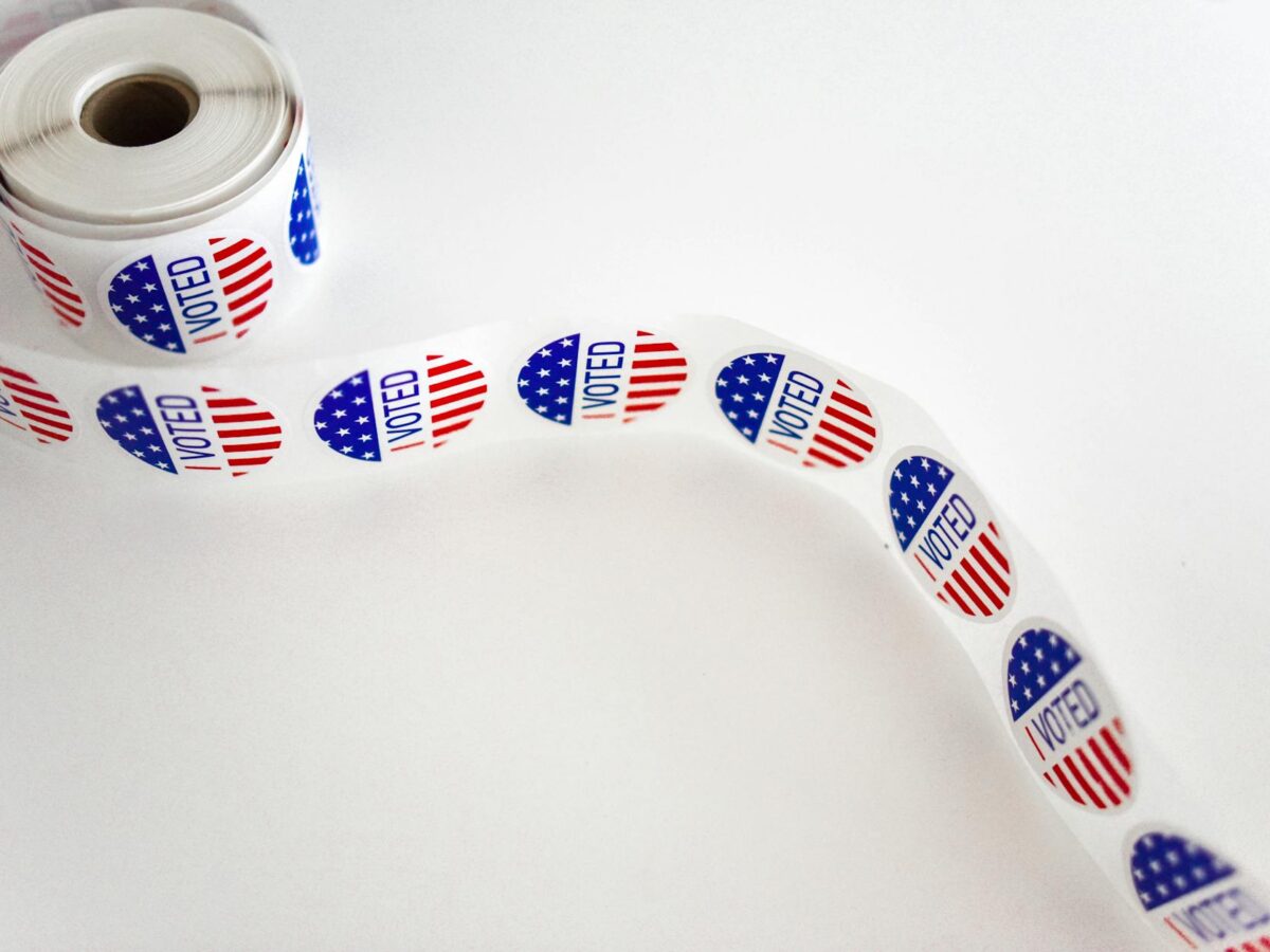 i voted sticker spool on white surface